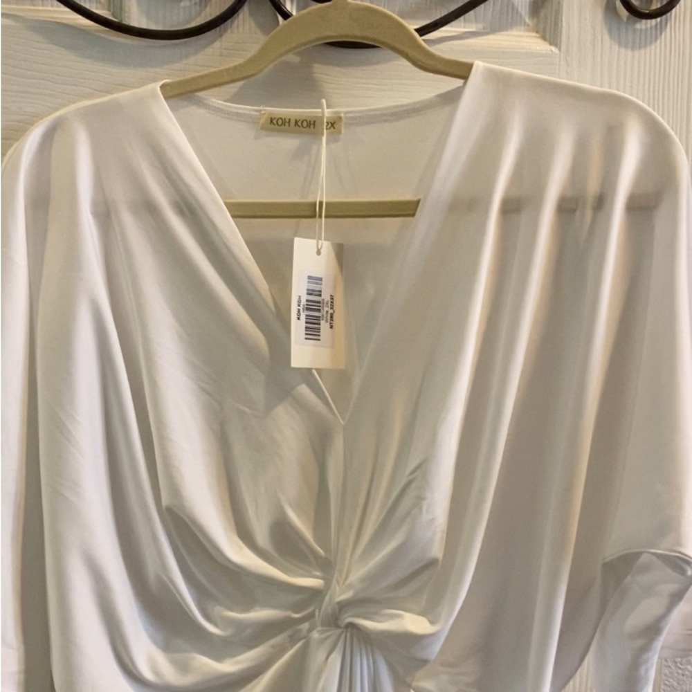 A beauty in softness! Imagine the photos you’ll take in this dress!